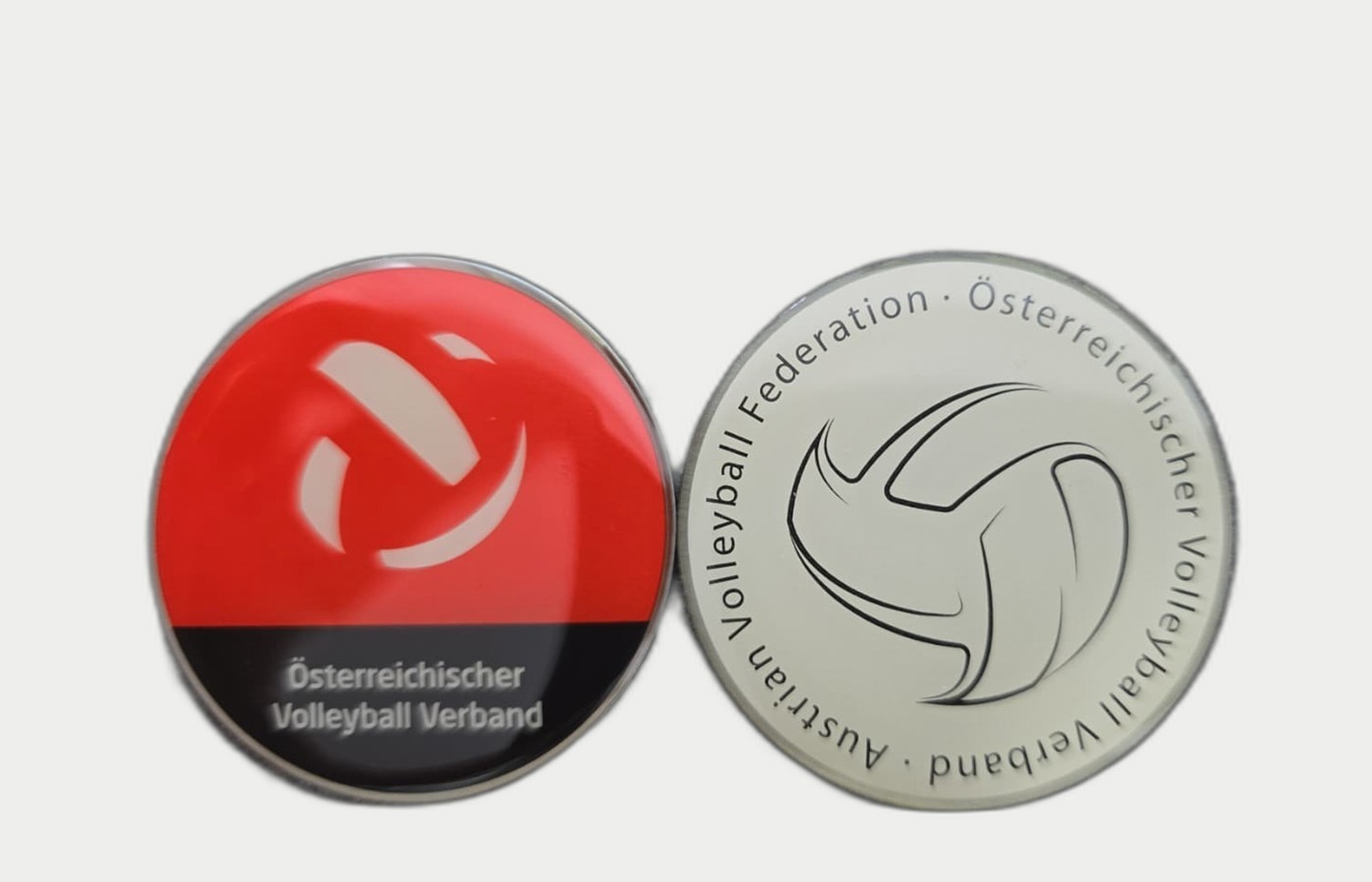 Toss Coin mit ÖVV Logo und Volleyball